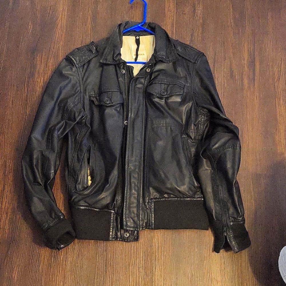 Diesel Leather jacket, unisex , gives you a thinner look ,something I didn't lik